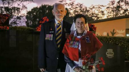 Nelson Bay RSL Sub-Branch welfare officers John Collins and Megan Ambrose at the war memorial in Apex Park following the dawn service last year. 