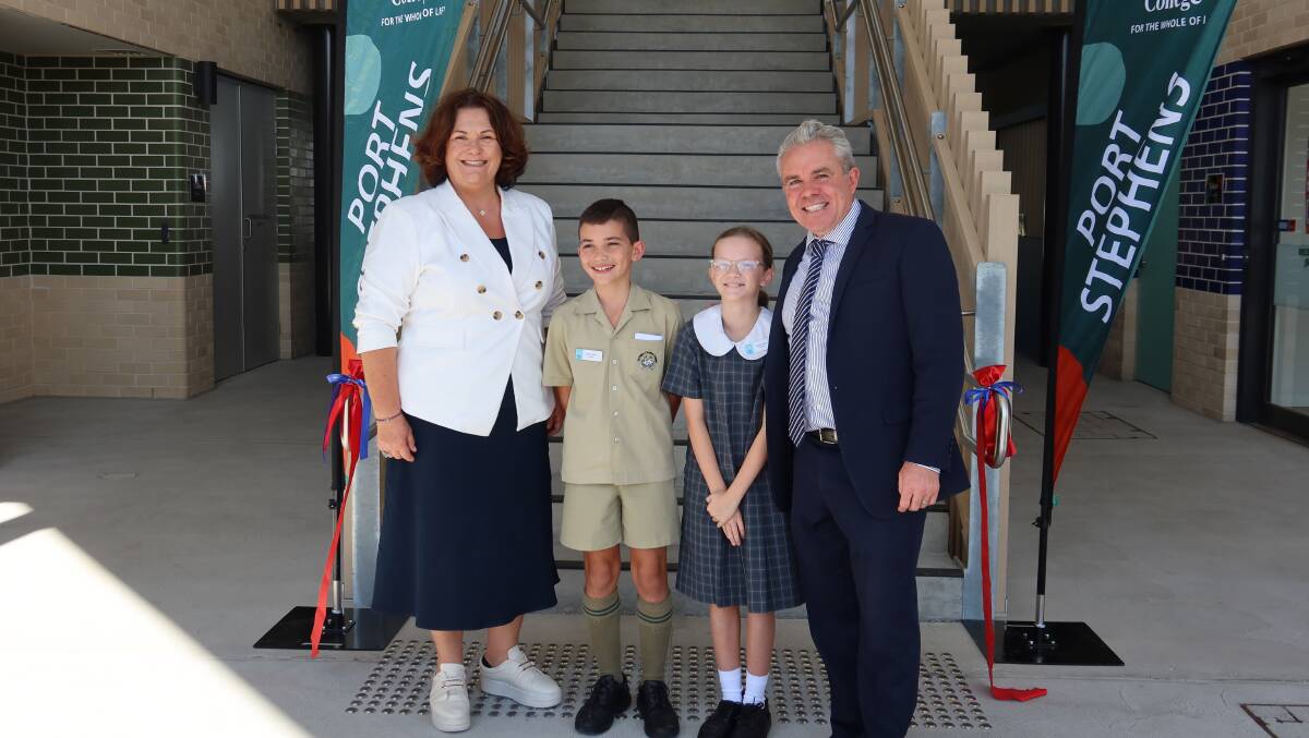 Member for Paterson Meryl Swanson and St Philip's Port Stephens principal Martin Telfer with junior students Ethan and Zoe. Picture by Laura Rumbel
