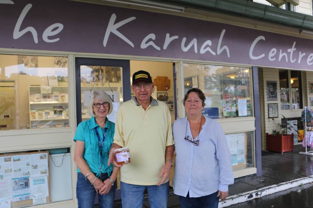 VOLUNTEERS: Fred McInerney with volunteer staff Frances Weatherstone (left) and Michele Barclay from the Karuah Centre, which is awaiting repairs to its guttering.
