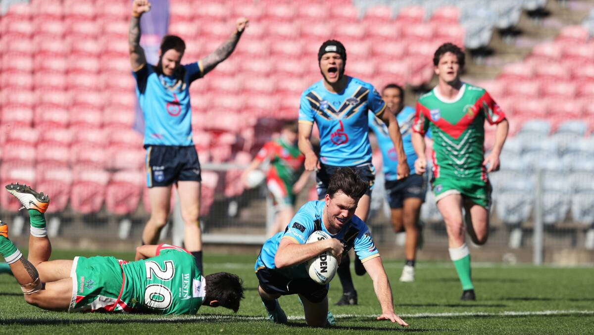 The Northern Hawks score during the recent Newcastle Rugby League reserve-grade grand final. Picture by Peter Lorimer