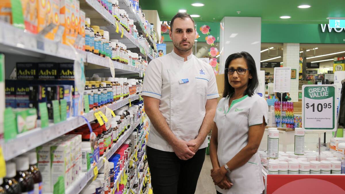 Raymond Terrace pharmacists Tim Mizzi and Rachel Mulley fear what will come from Australia moving to a 60-day dispensing model, which is being proposed. Picture by Ellie-Marie Watts