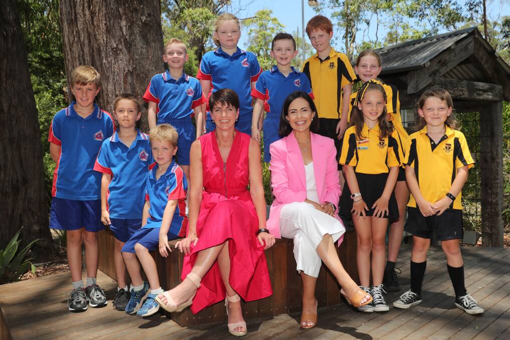 Port Stephens MP Kate Washington and Labor's Shadow Minister for Education Pru Car with Medowie primary school students in January 2023 when Labor made its 2023 election commitment to build a public high school in the suburb. Picture by Peter Lorimer