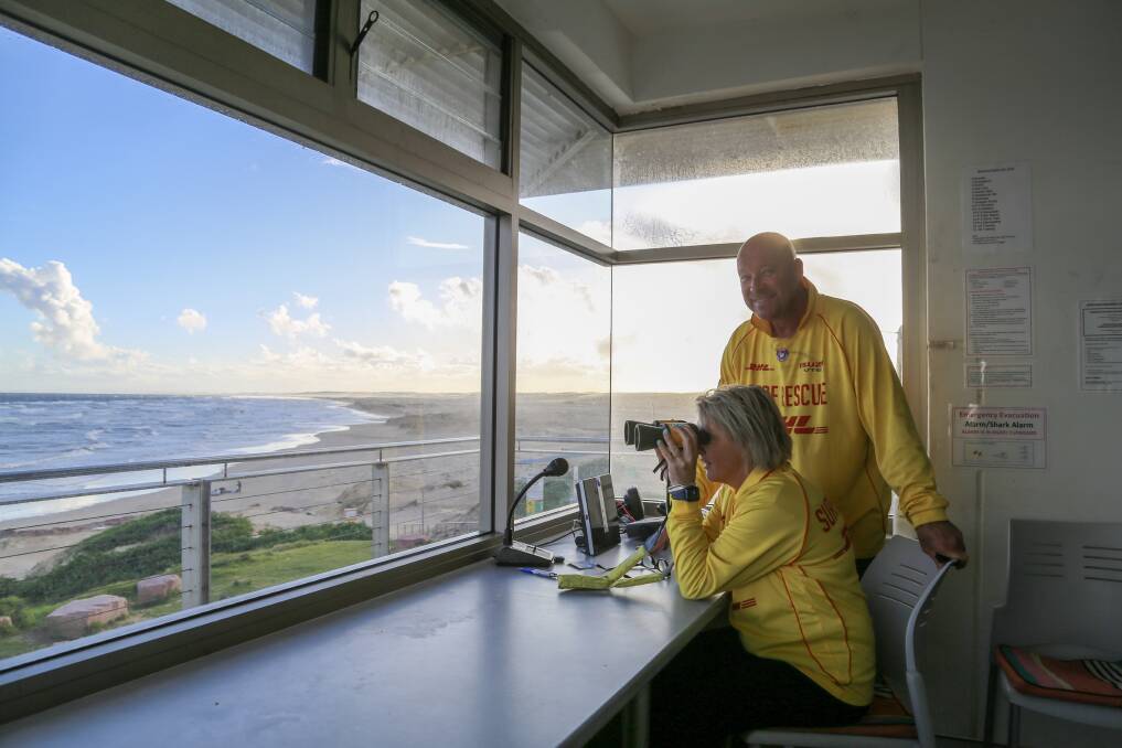 Kylie Kepreotis and Greg Williams in the Birubi Point Surf Life Saving Club watchtower. The club will host an open day on september 18. All members of the community are invited to attend.