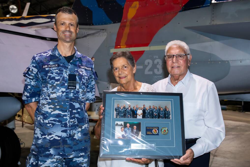 Airbase Executive Officer Squadron Leader David Crossman presented Worimi Elders Aunty Lorraine Lilley and Uncle Neville Lilley with a presentation in front of the F/A-18A Worimi Hornet on display at the Williamtown Aviation Heritage Centre. Picture by CPL Craig Barrett