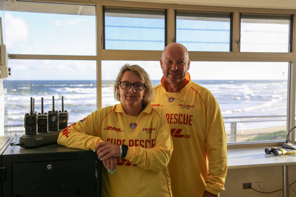 Birubi Point Surf Life Saving Club members Kylie Kepreotis and Greg Williams in the surf club's watchtower.