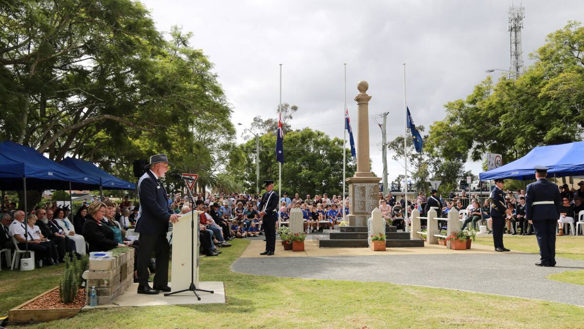 Raymond Terrace RSL Sub-Branch president Vic Jones speaking at the mid-morning Anzac Service in Anzac Park on Tuesday, April 25. About 3500 people turned out to the 11am service. 